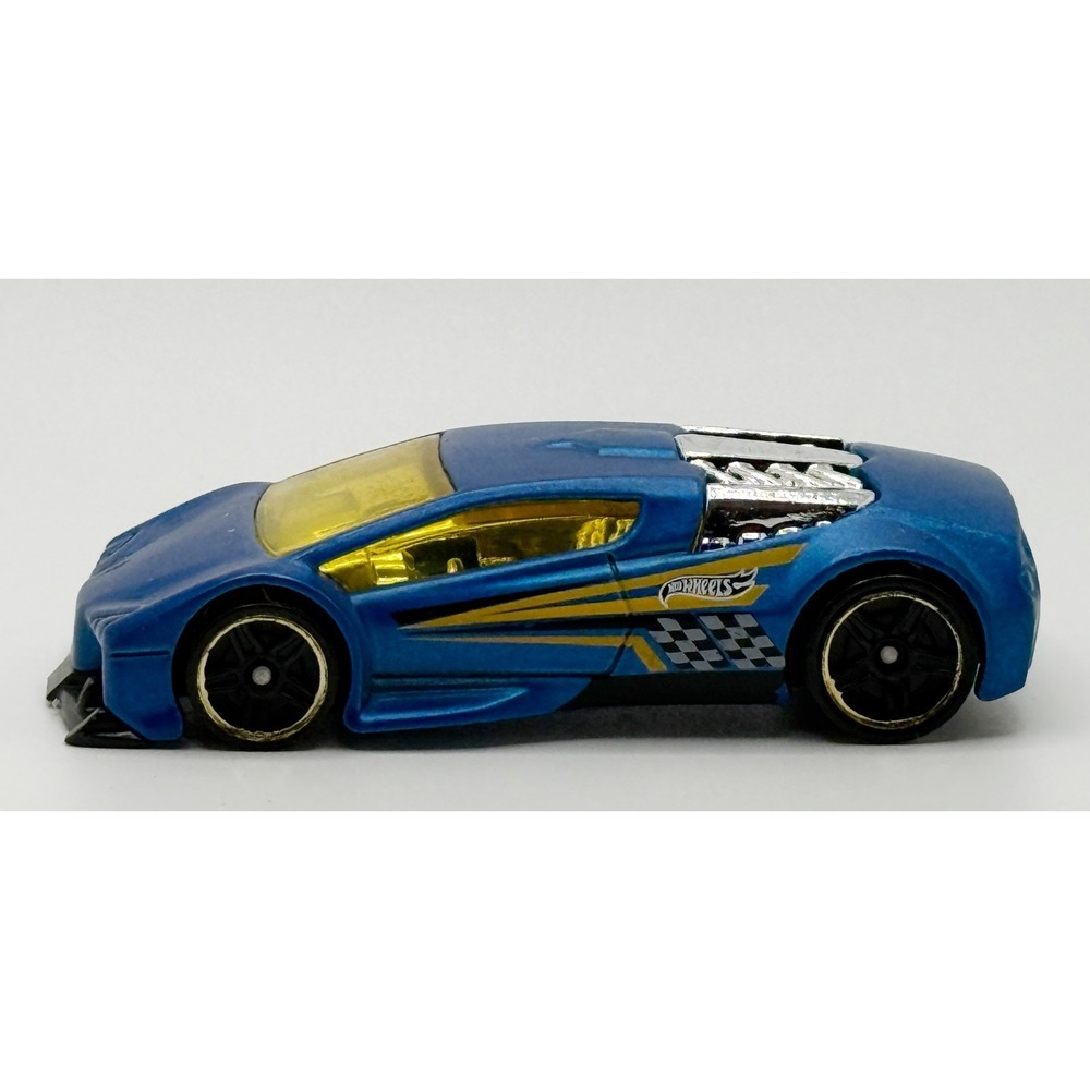 HOT WHEELS ZOTIC BLUE 1;64 DIECAST 2 3/4" CAR W YELLOW BLACK WHITE & CHROME 2002